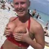 holding boobs baech babe