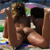 woman sunbathing her ass